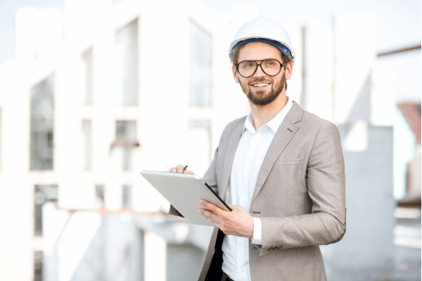 Project engineer holding a tablet, ready to support the site team
